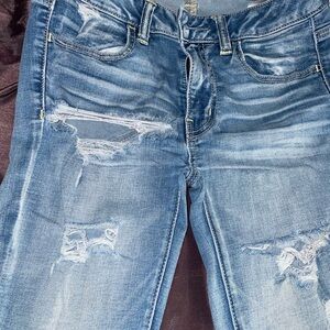 American Eagle Outfitters Blue Jeggings with Distressing and Fading